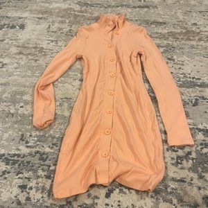 Orange long sleeved dress